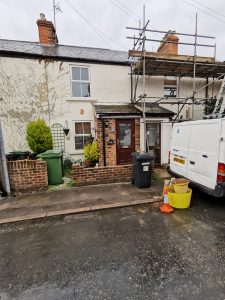 A terraced house with scaffolding