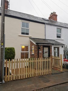 Terraced house with wooden fence