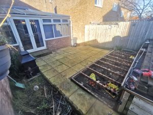 A patio with vegetable beds