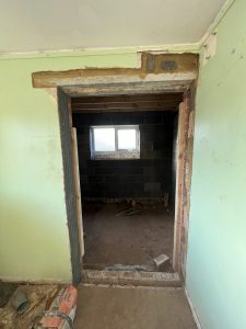 A building site with an open doorway
