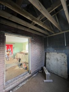 A building site with exposed rafters