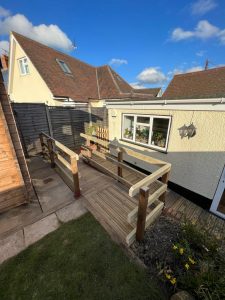 A wooden ramp leading into a bungalow