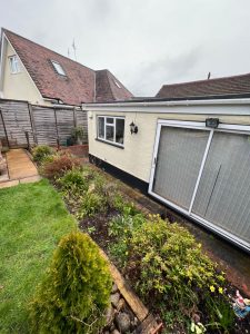 A view of a garden outside a bungalow